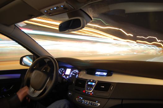 speed car at night in motion with traffic