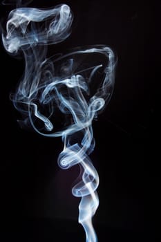 abstract smoke background or smoking concept on black