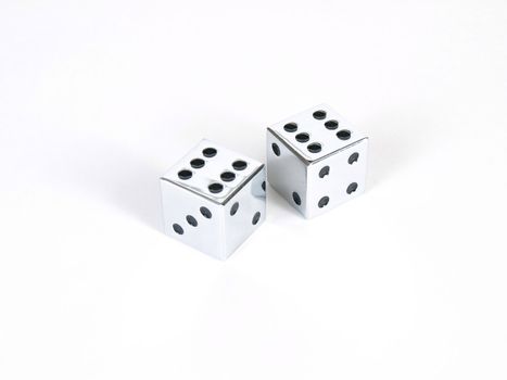 A pair of silver dice showing double sixes, or boxcars, on a white background.