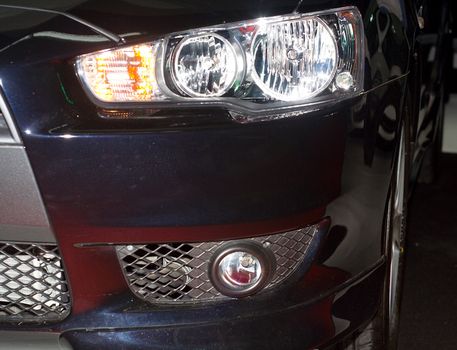 headlight of new black car