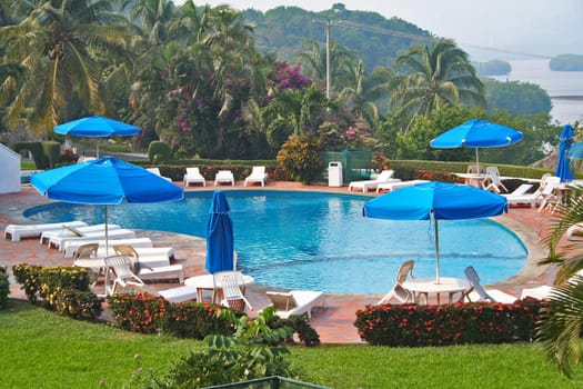 Luxury tropical pool overlooking ocean lagoon