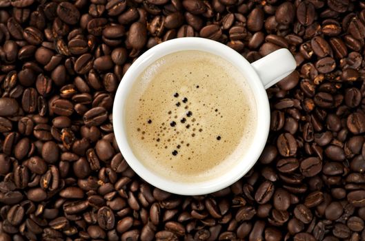 Image of a Cappuccino on coffee beans