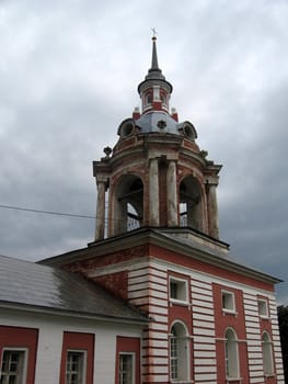 Old Moscow orthodox church from red and white bricks