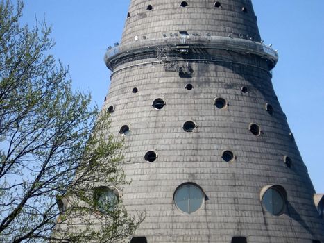 The basis of high Moscow tower on a background of blue sky