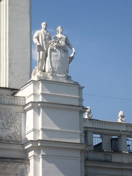White statue of two workers in Moscow at sunny day