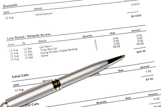 Silver Pen On A Monthly Phone Bill Statement, Business Background