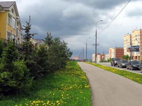 Automobile urban road in Moscow area at spring day