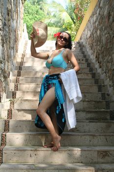 Young latino woman on stairs