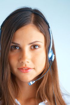 Support phone operator in headset on light blue background