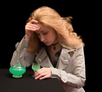 The long-haired girl with a wine-glass of absinthe liqueur