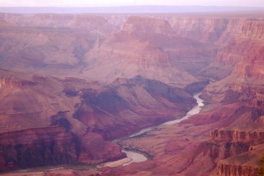 Section of Colorado River wending it's way through the Grand Canyon, Arizona at dusk