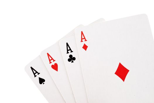 Playing cards on white background, taken close-up 
