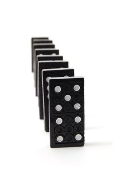 chain of dominoes isolated on a white background