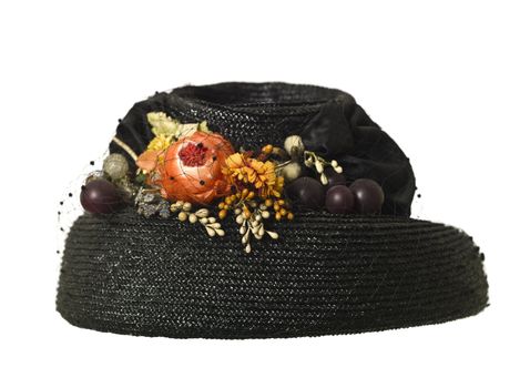 Female hat with flowersisolated on white background