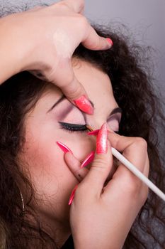 Make-up creation procedure for young woman