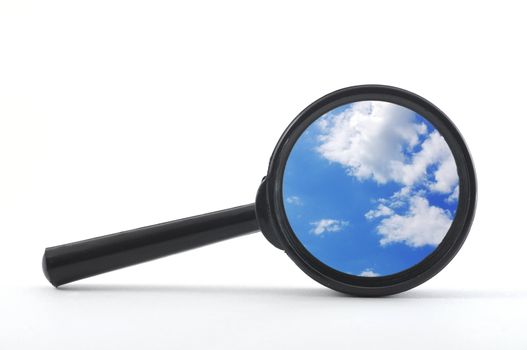 blue sky and magnifying glass showing freedom