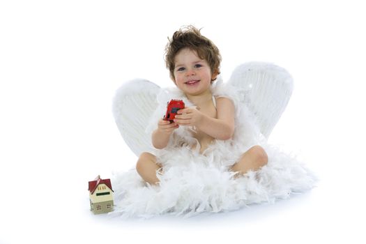 Little angel with car and house on isolated background