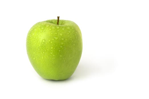 Green isolated apple with water droplets