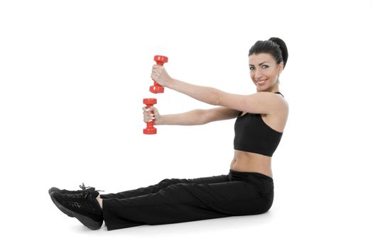 beautiful girl with dumbbells on  isolated background