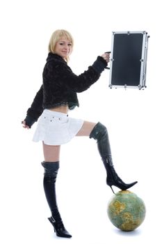 Beautiful blonde with valise and globe on isolated background