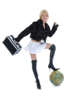 Beautiful blonde with valise and globe on isolated background