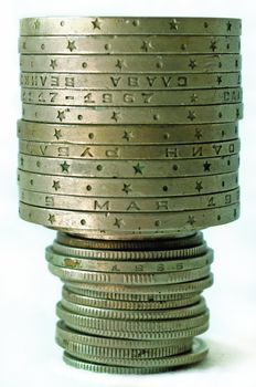 Coins tower on white background