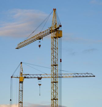 Several construction cranes