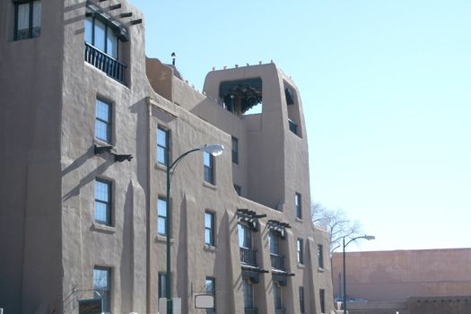 Adobe style building with wood beams