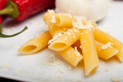 rigatoni pasta with parmesan cheese, garlic and chili