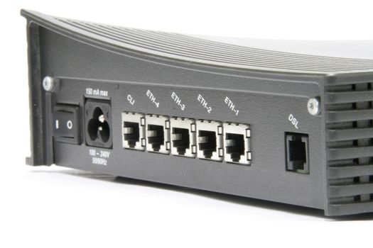 closeup 4-port DSL modem isolated on white background
