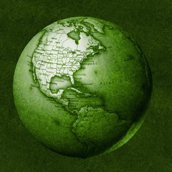 Green floating globe against a grassy background.