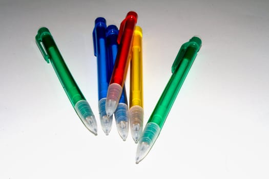 6 Colored Mechanical Pencils with Red, Yellow, Blue and Green colors isolated on a white background. 