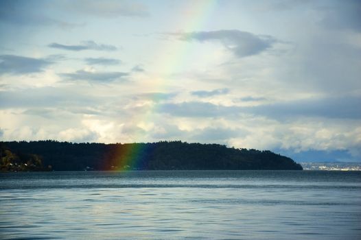 A brilliant rainbow over Puget Sound near Tacoma, Washington.