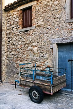 Italian cart outside old house