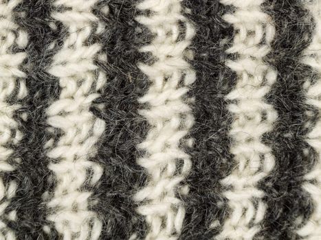 Close-up of striped wool socks. Woolen background.
