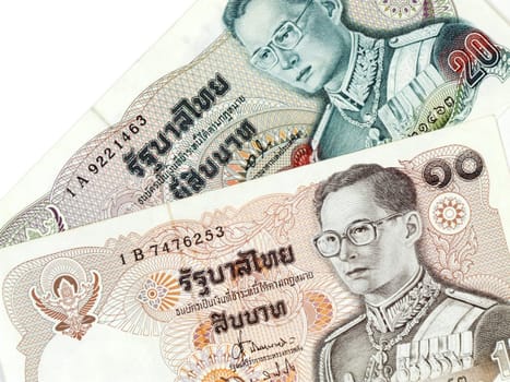 Two banknotes from Thailand. 10 baht and 20 baht.