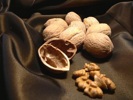 walnuts on brown silk cloth