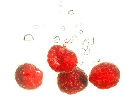  Splash of fresh raspberry to water with bubbles of air