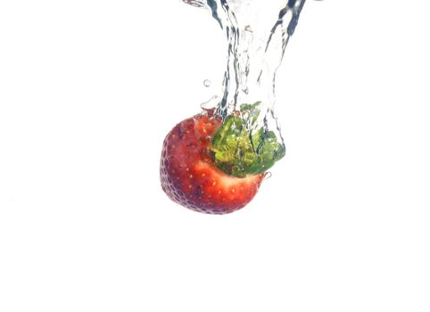  Splash of fresh strawberry to water with bubbles of air