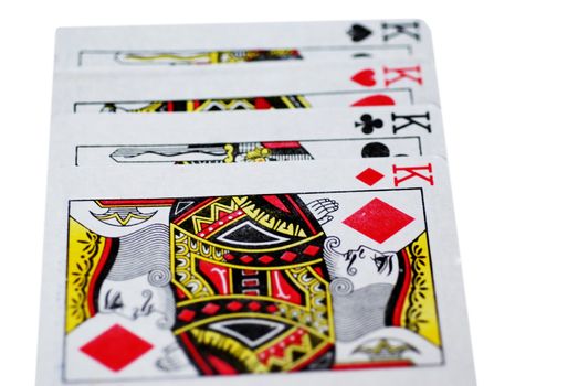 The four kings from a set of playing cards, isolated on a white background