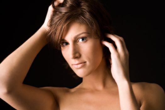 Studio portrait of a pretty brunette lady