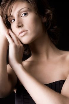 Studio portrait of a pretty brunette lady