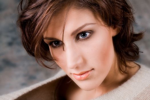 Studio portrait of a pretty brunette lady