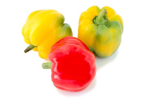 Three peppers (paprika) - red and yellow-green vegetables on overwhite background.