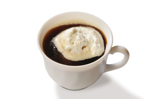 In white cup black coffee with ice-cream