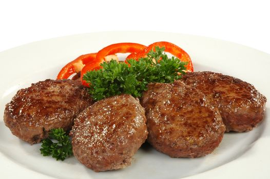 four cutlets with sweet pepper