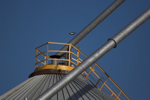 Grain reservoir detail  against a blue sky