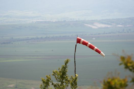 A  wind sock over blue sky