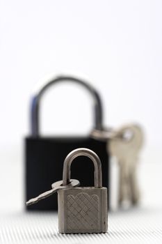 Padlocks and keys close up