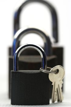 Padlocks and keys close up